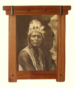 A traditional photograph in a Style B frame in Meranti with Ebony inlay. Closed corners are made with full mortise and tenon. Frame members are 2-1/2 “ wide. Prices start at $195.00